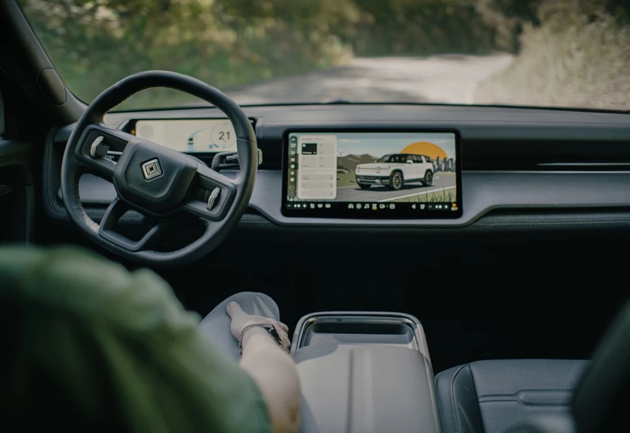 Uber taps Rivian to build robotaxis in deal worth up to $1.25B | TechCrunch