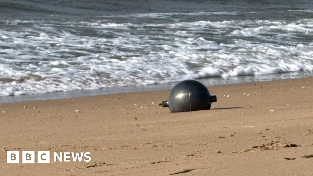 Australia probes mystery space balls that washed up on beach