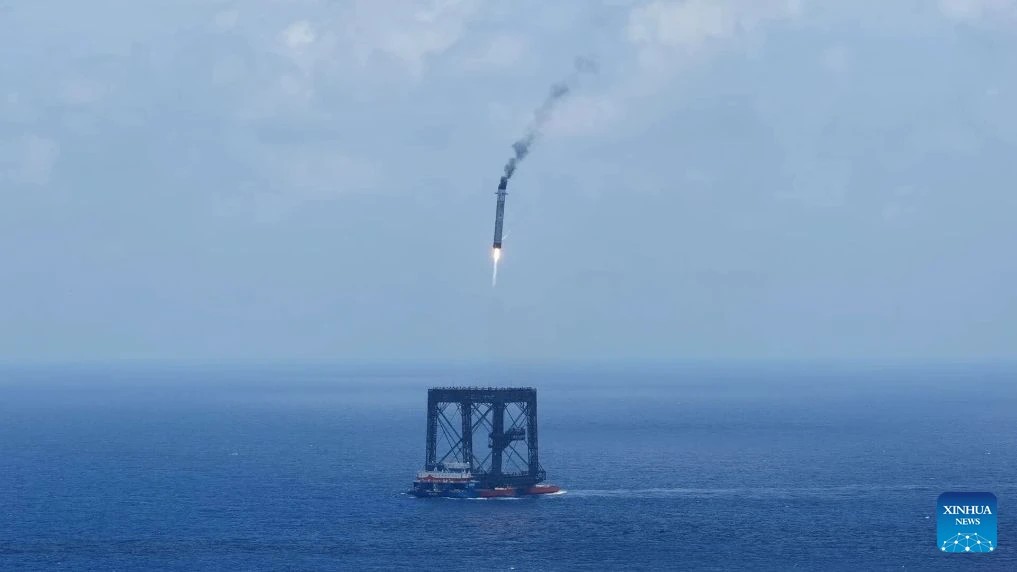 Watch China catch its first rocket booster — in a net