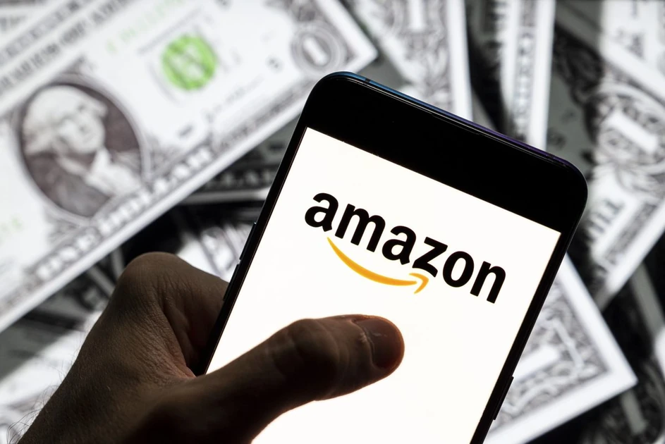 Amazon raises minimum wage by $1