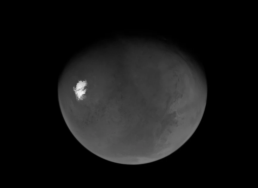What's that on Mars? Passing NASA spacecraft snaps unsolved mystery.