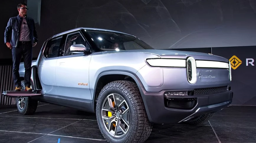 Rivian CEO says supervised point-to-point self-driving will arrive this year, and he’s comparing it directly to Tesla’s FSD